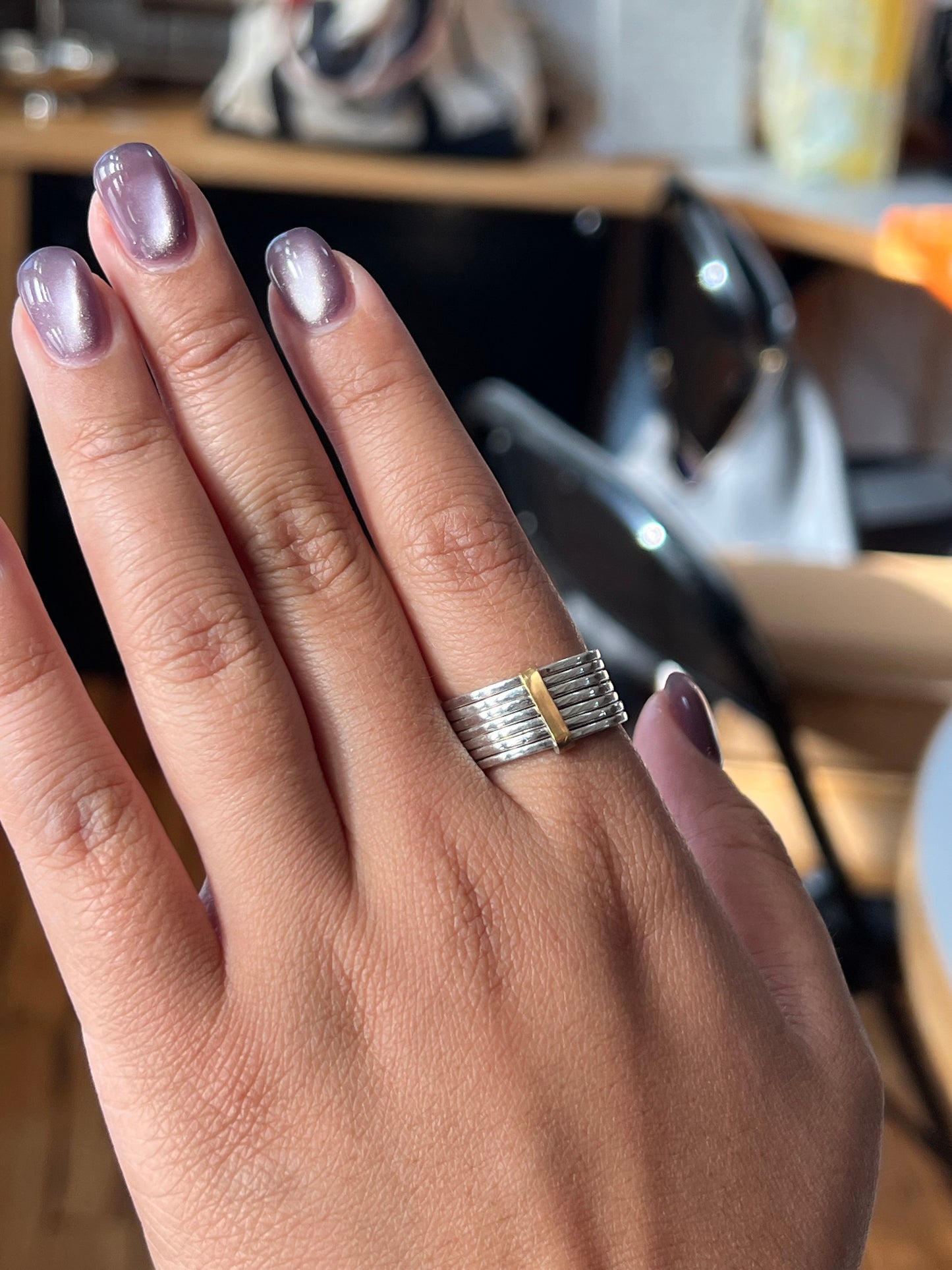 Stacked sterling silver 7 band ring with gold detail