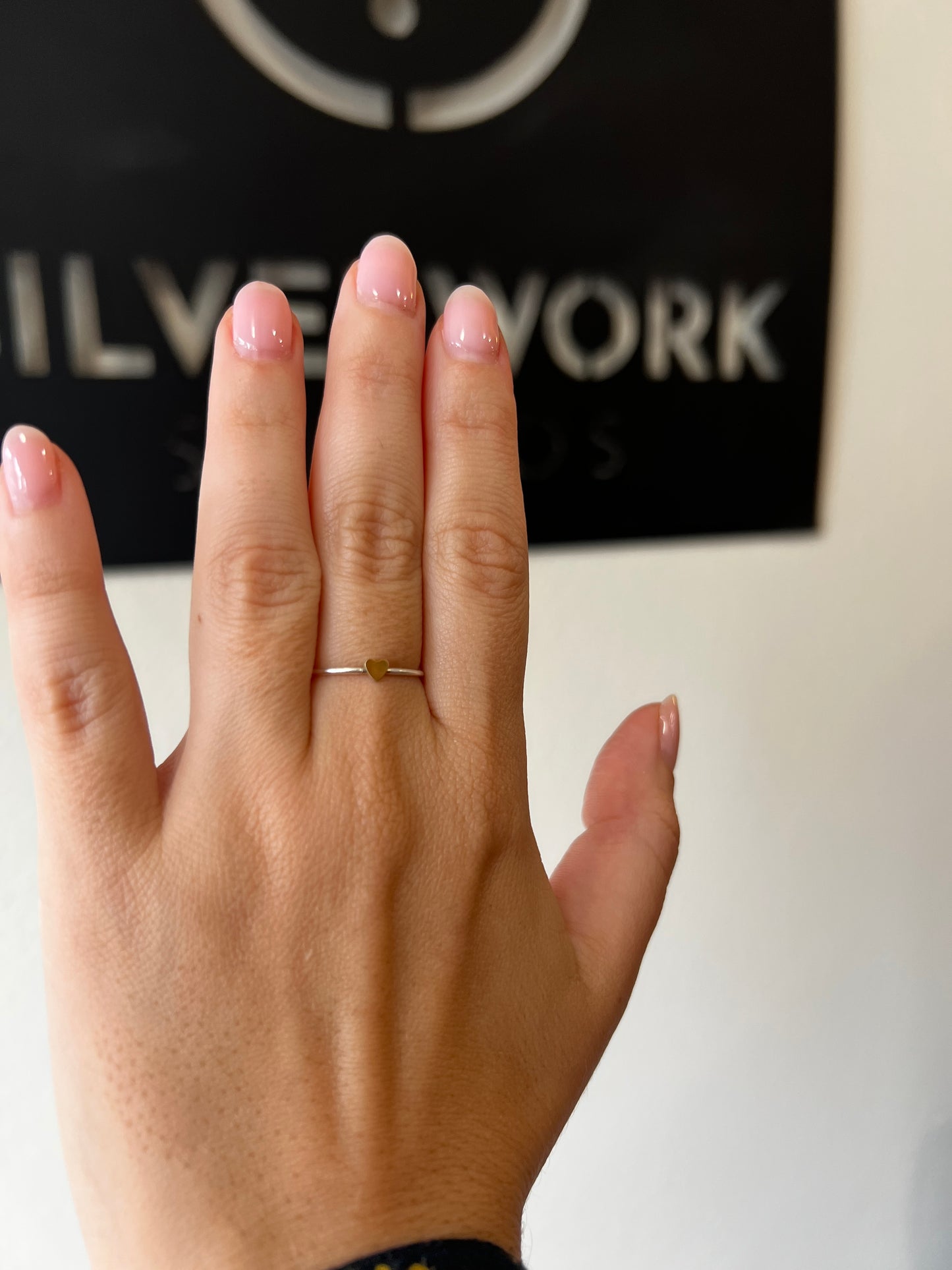 Delicate .925 silver band with gold plated heart ring