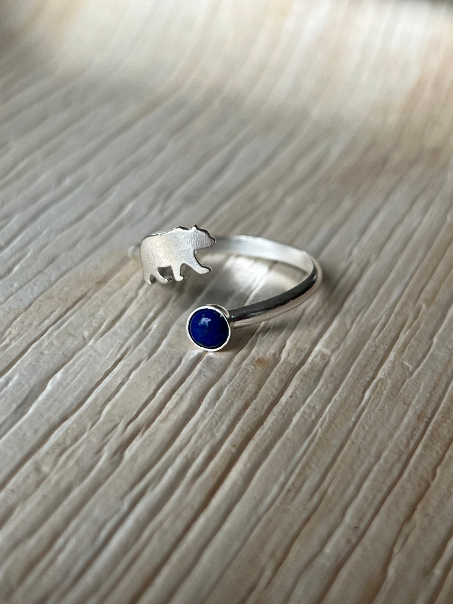 Silver ring with a bear and blue gemstone Cal Berkeley ring