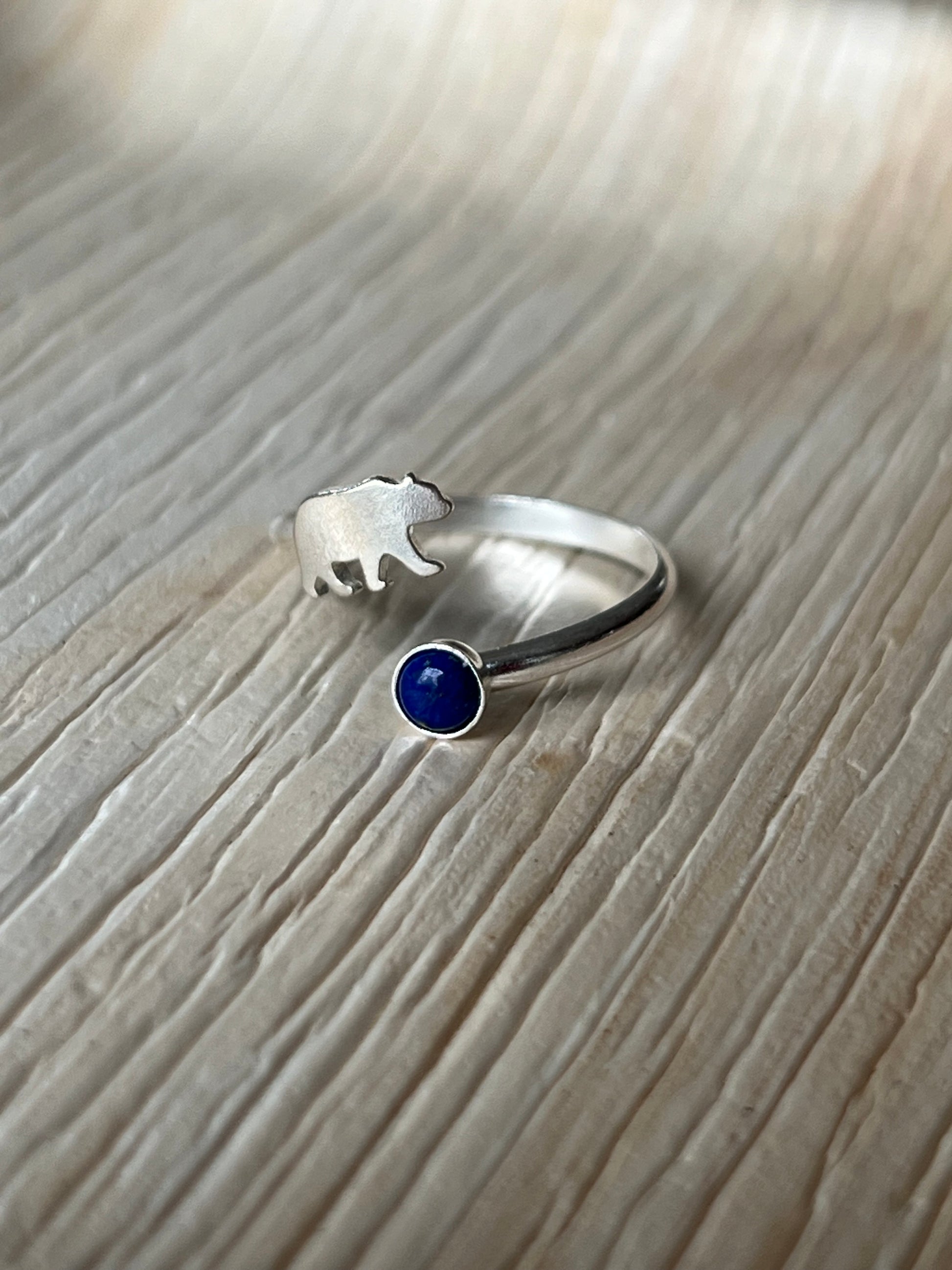 Silver ring with a bear and blue gemstone Cal Berkeley ring